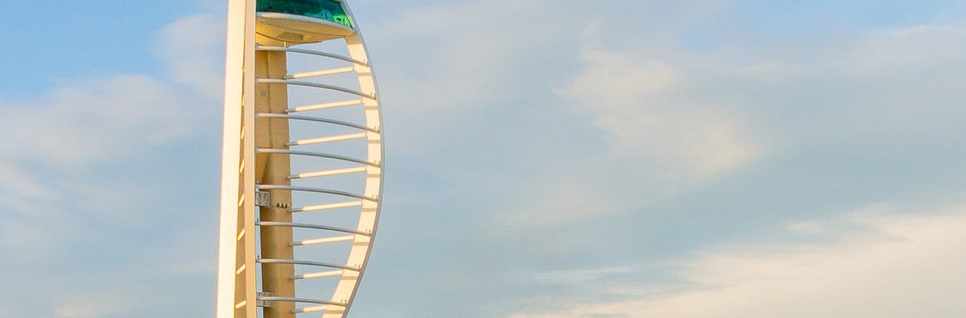 online vs classroom RYA theory — tall modern Spinnaker Tower against a clear sky