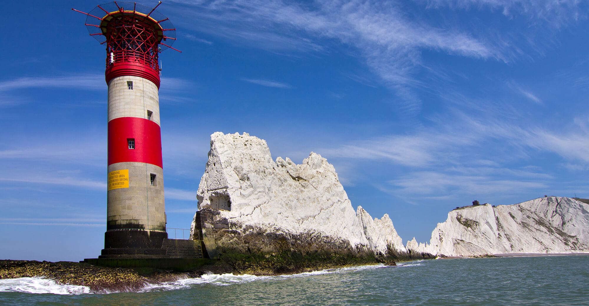 The Needles lighthouse and rock formations Isle of Wight visited during Yachtmaster Fast Track passages